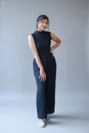 Minimalist Zairona black jumpsuit with flattering fit and modern tailoring.
